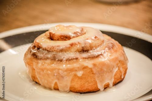 Delicious hot cinnamon roll with icing