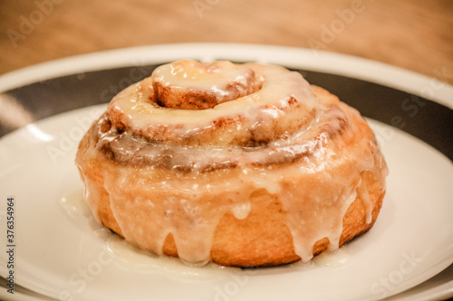 Delicious hot cinnamon roll with icing