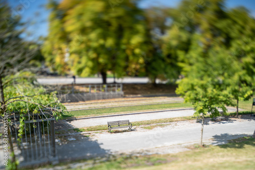 A picture of a bench taken using tilt-shift effect.  Vancouver BC Canada 