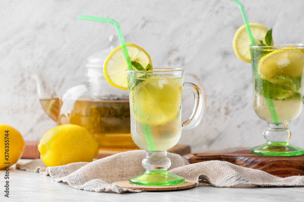 Cups of tasty cold ice tea on table Cups of tasty cold ice tea on table