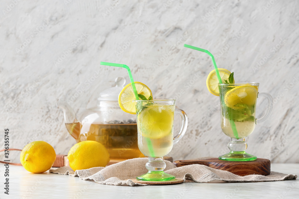 Cups of tasty cold ice tea on table Cups of tasty cold ice tea on table