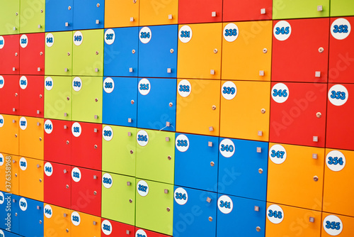 Colorful lockers in a shopping moll. Closed lockers as background