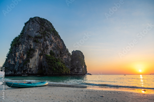 Tropical beach of Raillay in Thailand at sunset