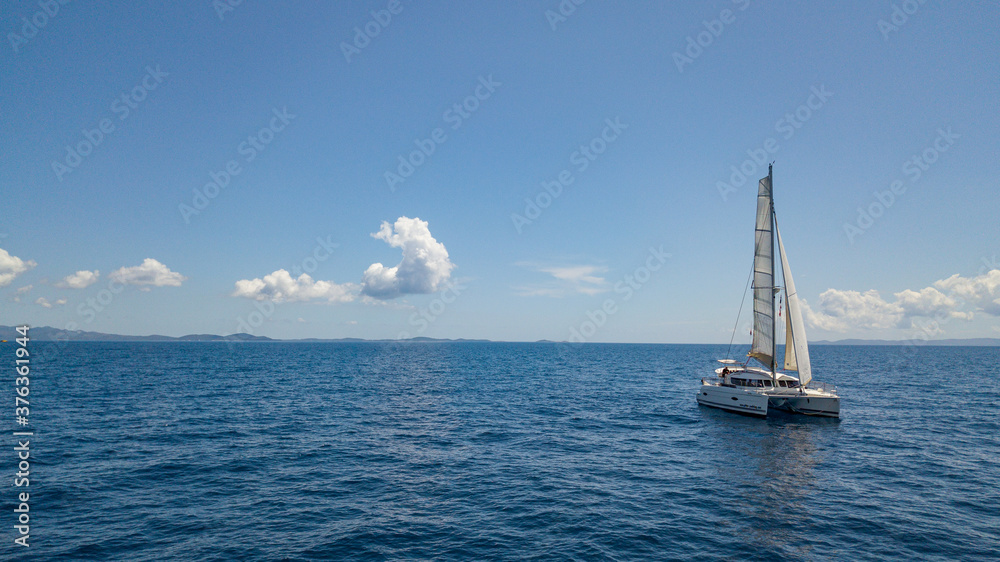 Obraz premium sailing a catamaran in adriatic sea