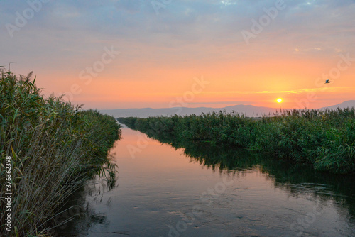 sunset colors with water canal 