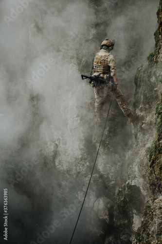 Soldier on the rocks