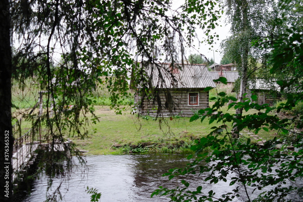 chopped village bath on the Bank of the cold Northern river near the forest