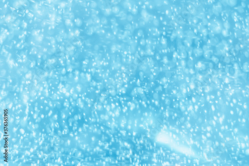 Christmas background. Abstract ice winter background. Frozen blue wall