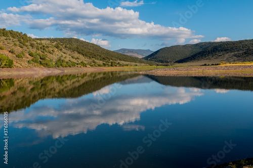 Fototapeta Naklejka Na Ścianę i Meble -  Reflections on the Still Waters of Foryth Reservoir, Dixie National Forest, Utah, USA