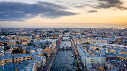 Aerial view of the city at sunset in Saint Petersburg, Panorama of the Fontanka River and the bridges across it. View of the city from above. Cities of Russia. Petersburg in the summer.