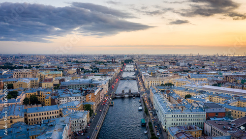 Aerial view of the city at sunset in Saint Petersburg, Panorama of the Fontanka River and the bridges across it. View of the city from above. Cities of Russia. Petersburg in the summer. photo