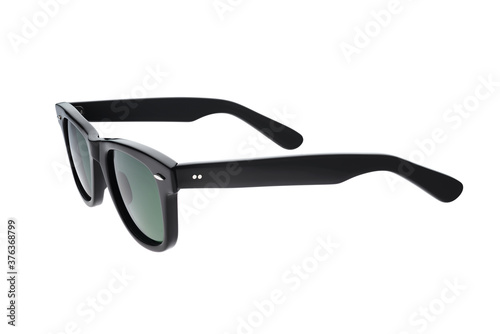 Black plastic sunglasses isolated on white background. photo