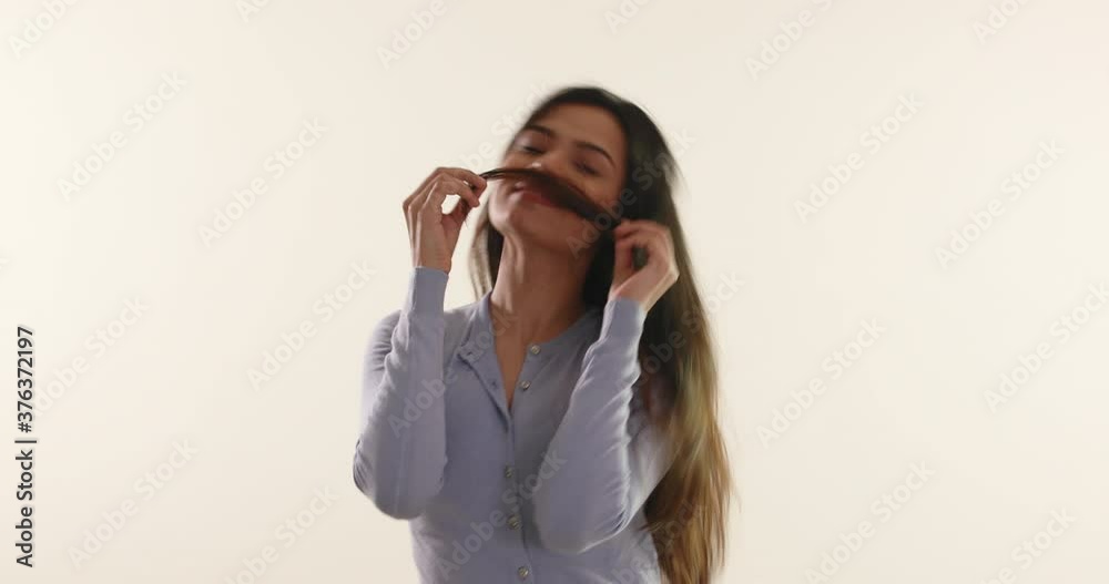 Beautiful woman goofing around with her hair Beautiful woman goofing around with her hair