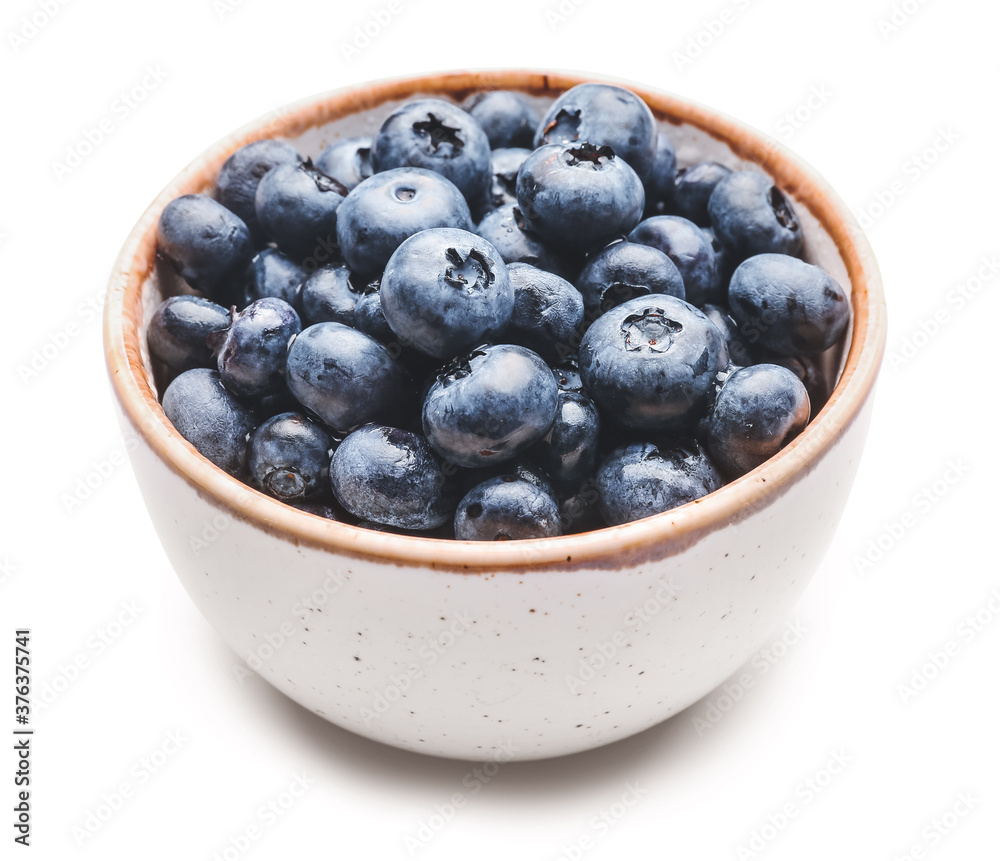 Bowl with tasty blueberry on white background Bowl with tasty blueberry on white background