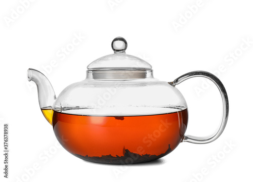 Teapot with hot beverage on white background