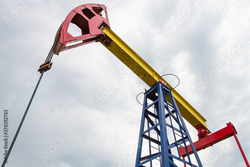 oil pumpjack against the sky