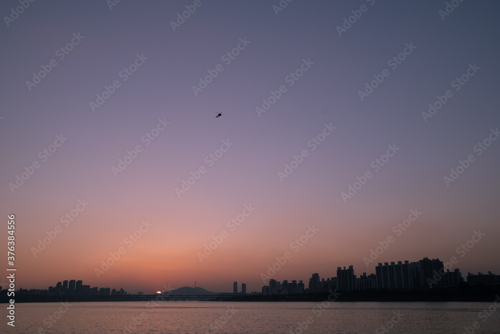 hangang sunset with helicopter