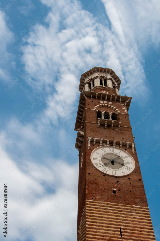 Clock Tower in Verona Italy and blue sky