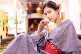 Young woman in traditional Japanese kimono, Japanese concept of kimono and yukata.