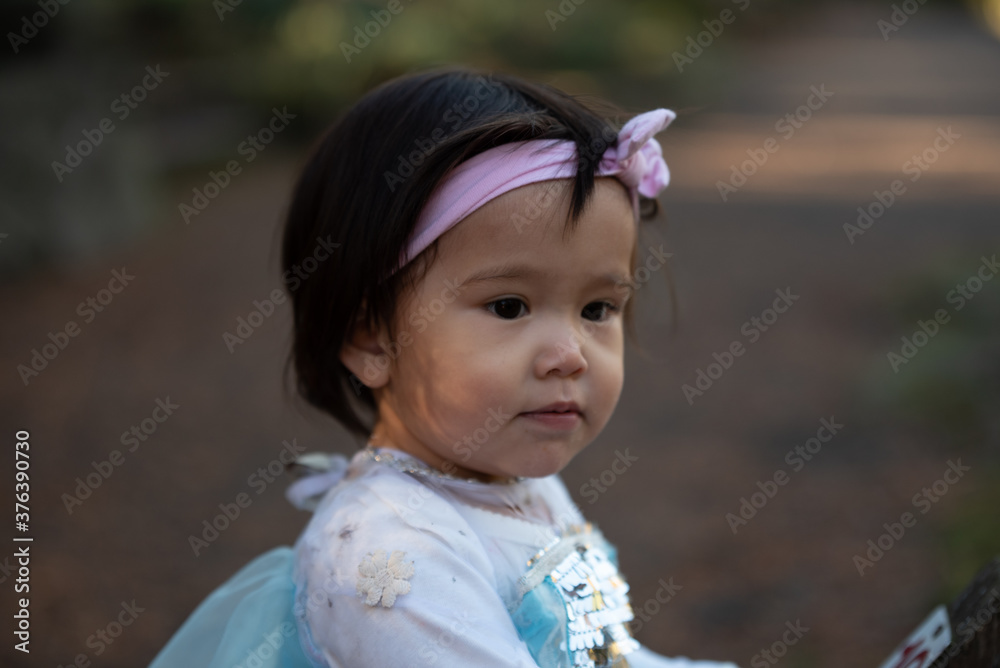 little princes girl playing in the park little princes girl playing in the park