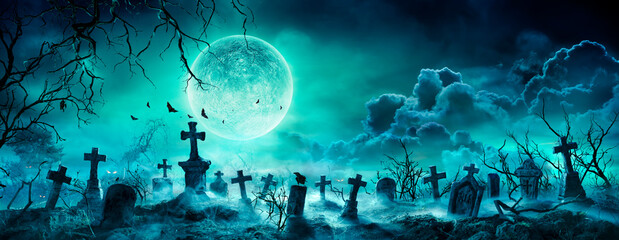 Graveyard At Night - Spooky Cemetery With Moon In Cloudy Sky And Bats
