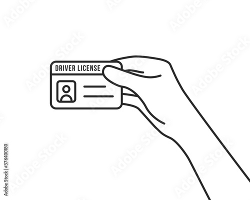 hand holding thin line driver license