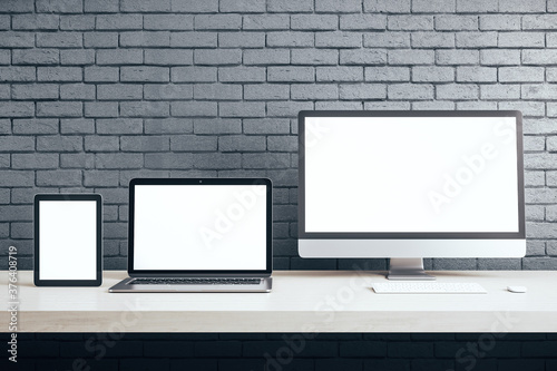 Personal computer  digital tablet and laptop with blank screen.