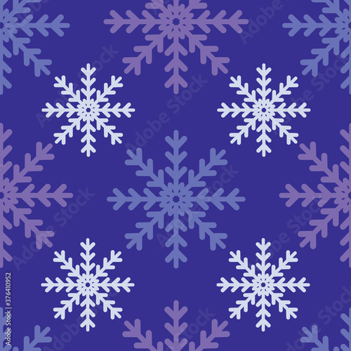 Tonal blue and white snowflakes on a blue background. Seamless vector repeat pattern. Great for holidays, christmas, home decor, wrapping, fashion, scrapbooking, wallpaper, gift, kids, apparel.