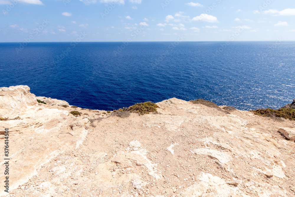 Blue sea panorama. Sea with crystal clear blue water and rocks. Mediterranean sea, island of lampedusa, sea nature reserve. Relax diving and swimming at sea