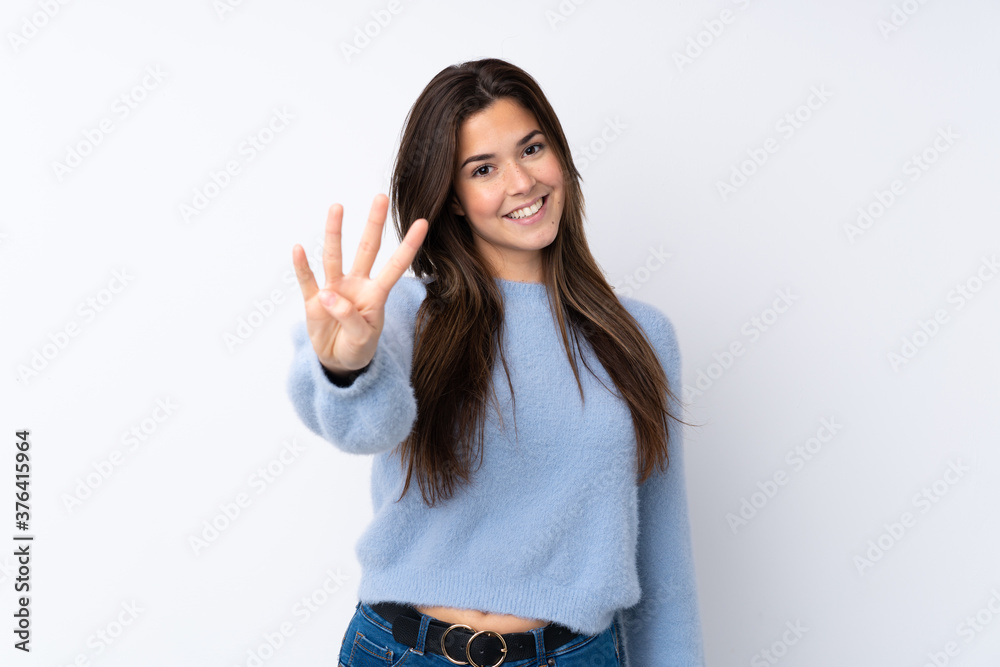 Young teenager Brazilian girl over white background Young teenager Brazilian girl over white background