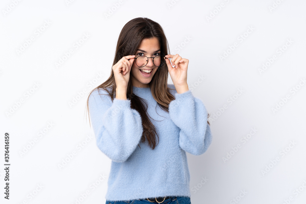 Young teenager Brazilian girl over white background Young teenager Brazilian girl over white background