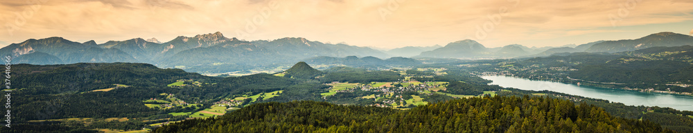 Panorama of Alpine mountains near Lake Worthersee and Velden city