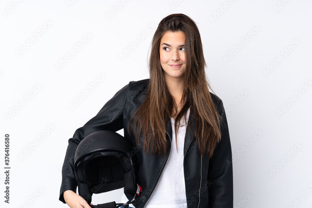 Young teenager Brazilian girl over white background Young teenager Brazilian girl over white background