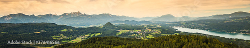 Fototapeta Naklejka Na Ścianę i Meble -  Panorama of Alpine mountains near Lake Worthersee and Velden city