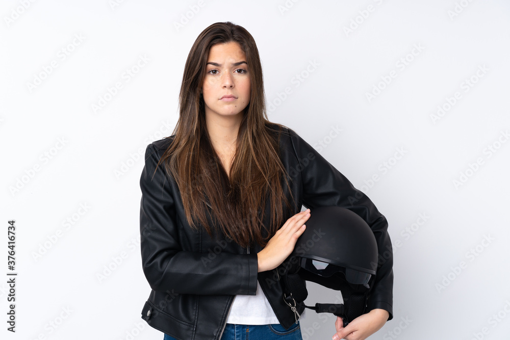 Young teenager Brazilian girl over white background Young teenager Brazilian girl over white background