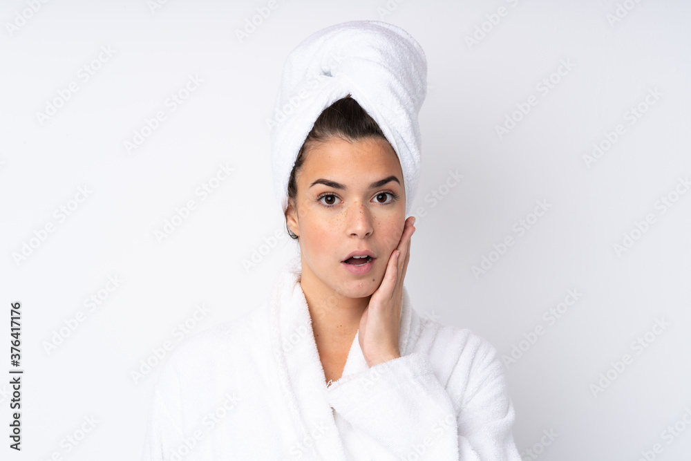 Young teenager Brazilian girl over white background Young teenager Brazilian girl over white background