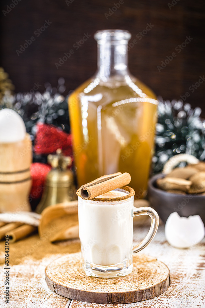 hot eggnog typical of Christmas, made at home all over the world, based on eggs and alcohol. called eggnog, Auld Man's milk, milk and pisco, momo cola, coquito or Crème de Vie or Eierlikör hot eggnog typical of Christmas, made at home all over the world, based on eggs and alcohol. called eggnog, Auld Man's milk, milk and pisco, momo cola, coquito or Crème de Vie or Eierlikör
