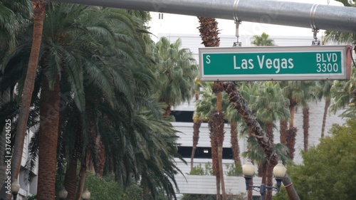 Fabulos Las Vegas, traffic sign on The Strip in sin city of USA. Iconic signboard on the road to Fremont street in Nevada desert. Symbol of casino money playing, betting and hazard in gaming area photo