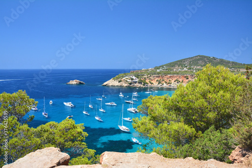 Cala d'Hort bay with turquoise water on Ibiza island, Spain. photo