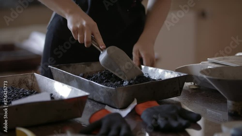 Slow-mo: Female Laboratory Technician Mixes Small Bitumen Samples