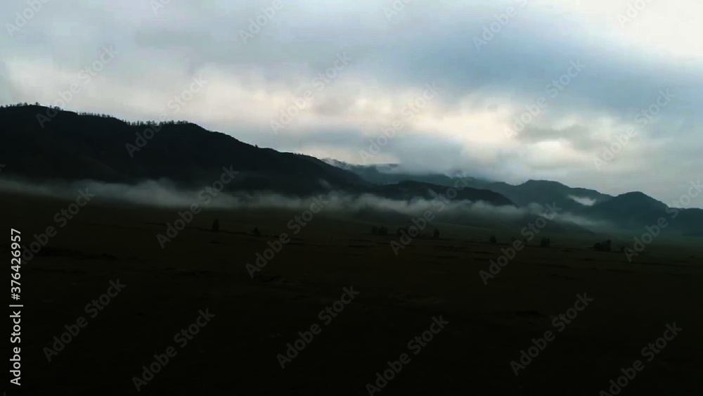 mountains in the fog