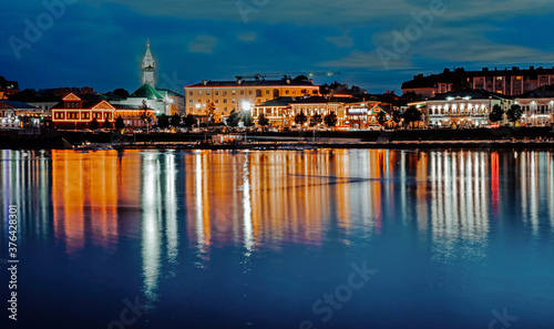 A view of Old Tatar district in Kazan at night. Reflection of lights in water. © Adsloboda