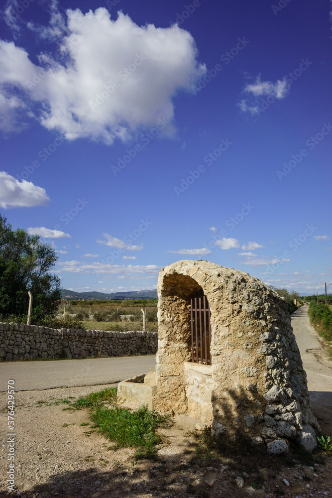 Naklejka premium Pou Celat, pozo de origen medieval,Porreres, mallorca,islas baleares, Spain, europa