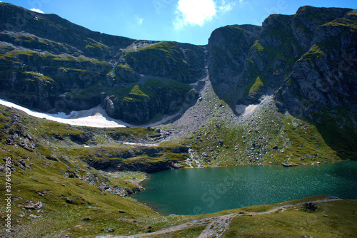 Fototapeta Naklejka Na Ścianę i Meble -  Kleiner alpiner See auf dem Pizol in der Schweiz 7.8.2020
