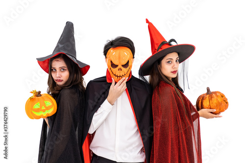 Fototapeta Group of Asian man and woman wearing Halloween costume as witch and vampire Drac
