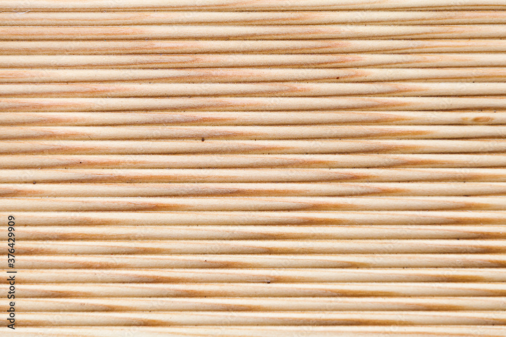 Uncolored larch boards, close-up background photo Uncolored larch boards, close-up background photo