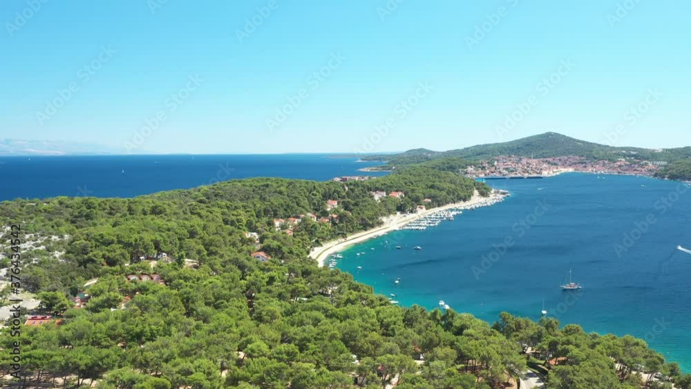 Drone aerial view of the island of Losinj, beautiful Adriatic coastline and town of Mali Losinj in background. Kvarner bay, Croatia, Europe.
Drone aerial view of the island of Losinj, beautiful Adriatic coastline and town of Mali Losinj in background. Kvarner bay, Croatia, Europe.