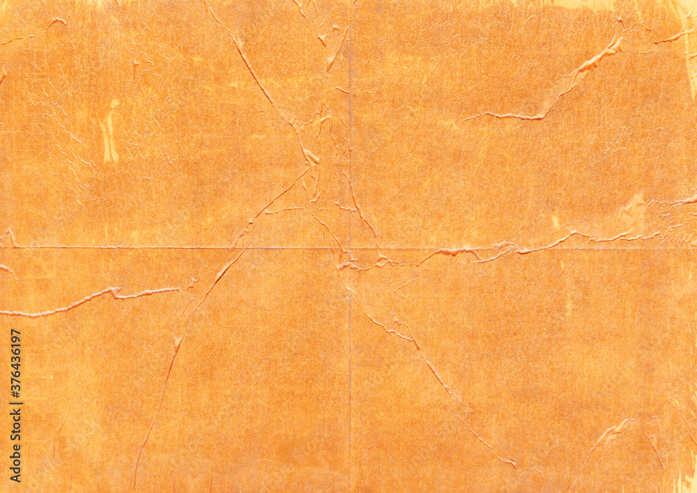 Fototapeta premium Close-up of orange parchment, texture background