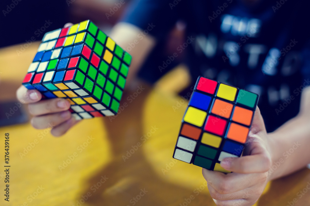 Bangkok, Thailand - September 7, 2020 : Woman solving Rubik's Cube ...