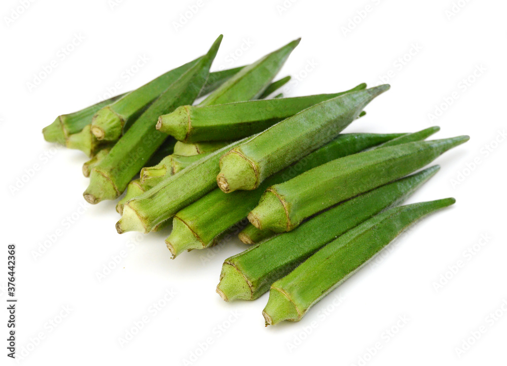 Fresh raw okra isolated on white background, horizontal with copy space Fresh raw okra isolated on white background, horizontal with copy space